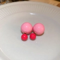 Macro view of pink and fuchsia double bead sphere earrings on white ceramic plate - Double Bead Round (21#) / Pink / Steel Earring Post