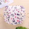 Beige drawstring cosmetic bag with makeup prints and portable storage design - Cream Makeup Print