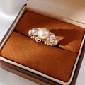 Macro shot of vintage round pearls and zircon inlay on a classic luxury gold ring band - Vintage Three-Color Pearl Combination Ring / 4# Ring - Light Coffee Gold (Multi-Pearl Vintage Style)