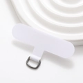 Macro shot of white reinforced fabric T-shaped phone lanyard tab with a metal D-ring - White