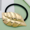 Elastic ponytail hair tie with a polished gold metal leaf decorative accent - Style 19 (Gold Glossy Large Leaf)