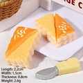 Miniature resin food charm of sliced cake with cheese knife accessory for DIY crafts - Two-tone Cheese Bread
