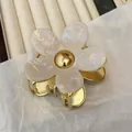 Elegant cream acetate flower hair claw clip with golden metal base for women - Mermaid Color