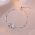 Adjustable silver sunflower bracelet with white cubic zirconia and green leaves - Sunflower Bracelet / Silver