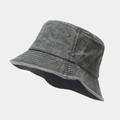 Detail view of washed cotton bucket hat with metal eyelets and vintage denim texture - M (56-58cm) / Army Green