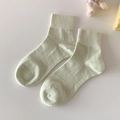 Pastel green vertical striped cotton socks with elastic ribbed cuffs in minimalist style - Milky Green