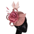 Elegant pink linen fascinator hat with fabric flower and feathers on a mannequin head - Dusty Pink