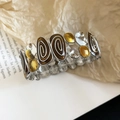 Bracciale elastico retrò con base in metallo argento e motivi a spirale in smalto marrone - Stile Strass con Motivo a Spirale Marrone Scuro su Base Argento / Argento-Caffè