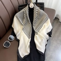 Fashionable black and white striped 90cm faux silk scarf displayed on a sofa - 23108 Main Image / 90*90cm