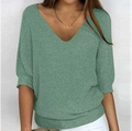 Detail of green V-neck knit sweater featuring a relaxed fit and short sleeves for daily wear - S / Tops / Grass Green