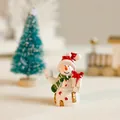 Miniature Christmas resin snowman figurine with red hat and green scarf for decor - 3.5x2.5x5cm
