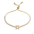 Detailed view of adjustable gold Gemini zodiac bracelet with white cubic zirconia crystals - Gold Gemini