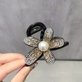 Elegant black flower hair claw clip with rhinestones and central pearl detail - Full Rhinestone Flower / Champagne