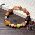 Mixed material Bodhi bead bracelet with lucky charms on vintage calligraphy book - Success Style (Budget)