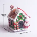 Detailed view of glowing clay gingerbread house with Christmas elements and size dimensions - Christmas House 15 (Santa Claus)