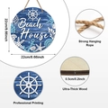 Detail showing the 0.5cm thickness and hemp rope hanger of the beach house wall sign - Round Beach Style (Y24Y50909_Q)