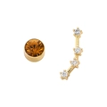 Asymmetric gold zodiac earrings featuring amber gemstone stud and sparkling curved ear crawler - Aries (Amber)