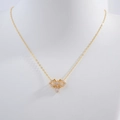Elegante collar con colgante de lazo en plata de ley S925 dorada con circonitas - Collar De Lazo Dorado Con Cadena En O