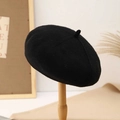 Classic black wool beret on a wooden stand with elegant vintage minimalist style - M (56-58cm) / Black