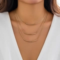 Three-layer gold minimalist snake bone necklace featuring sleek curved tube pendants - Gold (3-Layer Tube)