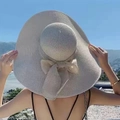 Beige wide-brim straw sun hat with large back bow detail for beach vacations - M (56-58cm) / Beige Hat With Beige Bowknot