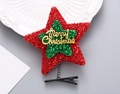 Detalle de una pinza para el pelo con estrella Merry Christmas, lentejuelas y muelle - Estrella