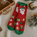 Christmas coral fleece warm socks with Santa and tree patterns on a white knit blanket - One Size / Star Tree Gift