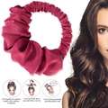 Detail showing burgundy satin hair scrunchie with three-step visual usage instructions - Burgundy