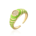 Macro detail of 18K gold plated copper ring with green enamel and pavé zircon stones - Bright Green
