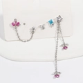 Detail of four-piece earring set with pink and blue zircons on jewelry card - One Size / White Gold