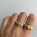 Smiling flower face ring in gold finish featuring yellow enamel and 18K plating - US 7 / Pea Green Wavy Smiley Flower