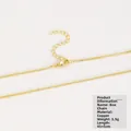 Detailed view of a gold-plated box chain necklace with a lobster clasp and extension - Box Chain / Gold