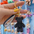 Black crystal studded bear keychain with gold ring and sparkling white leather strap - Black