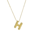 Golden brass bubble texture letter H pendant necklace with a minimalist fine chain - Necklace H