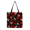 Detail of canvas tote bag featuring skull and red rose prints with sturdy black straps - Gothic Personality Skull and Blooming Red Roses (hm6639)