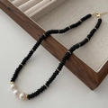 Tiger eye beaded necklace featuring black beads, gold accents, and three white pearls - Black Agate Pearl Necklace XL0302