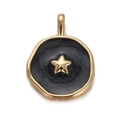 Detailed macro view of gold-plated celestial pendant with black enamel and gold star motif - Round Black Enamel with Gold Star (CX148-07)
