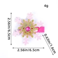 Pince à cheveux flocon de neige rose et or avec strass et détails de dimensions - Rose