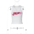 Macro shot of ribbed white crop top featuring pink heart print and black Gia font detail - S / White