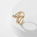 Detailed close-up of adjustable 18K gold ring with micro-pave baguette and round zircons - Style 4 / Gold