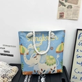 Sky blue canvas tote bag featuring elephant embroidery and white cotton rope handles - Beach Holiday Elephant