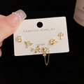 Detail of 6-piece gold earring set with moon and butterfly charms on jewelry card - Gold-Irregular Heart Planet Set (67#)