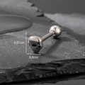 Skull tongue stud piercing in stainless steel with 0.67cm by 0.6cm dimensions - Mini X-marked Skull (S256)