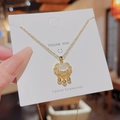 Gouden titanium stalen ketting met slot hanger voorzien van opaalsteen en kwastjes - Ruyi Slot / Goud