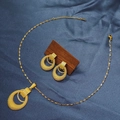 Detail of gold geometric earrings and necklace set with textured mesh on blue silk fabric - E6107-9/Gold Mesh Hollow Ring