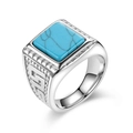 Macro shot of vintage titanium steel ring with square turquoise stone and greek key patterns - US 6