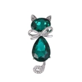 Close-up of cat brooch with green emerald-cut crystals and silver bow detail - Silver Emerald Green