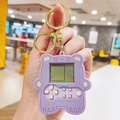 Purple bear-shaped mini handheld game console keychain with metallic gold clasp - Purple Bear Mini Game Console