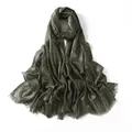 Dark green metallic yarn scarf with elegant shimmer finish and fringed edges - Green
