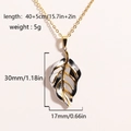 Collana minimalista con foglia bicolore in acciaio al titanio e catena d'oro 40+5cm - Design a Foglia